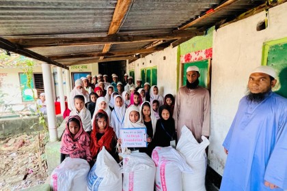 Uztaz and teacher with students